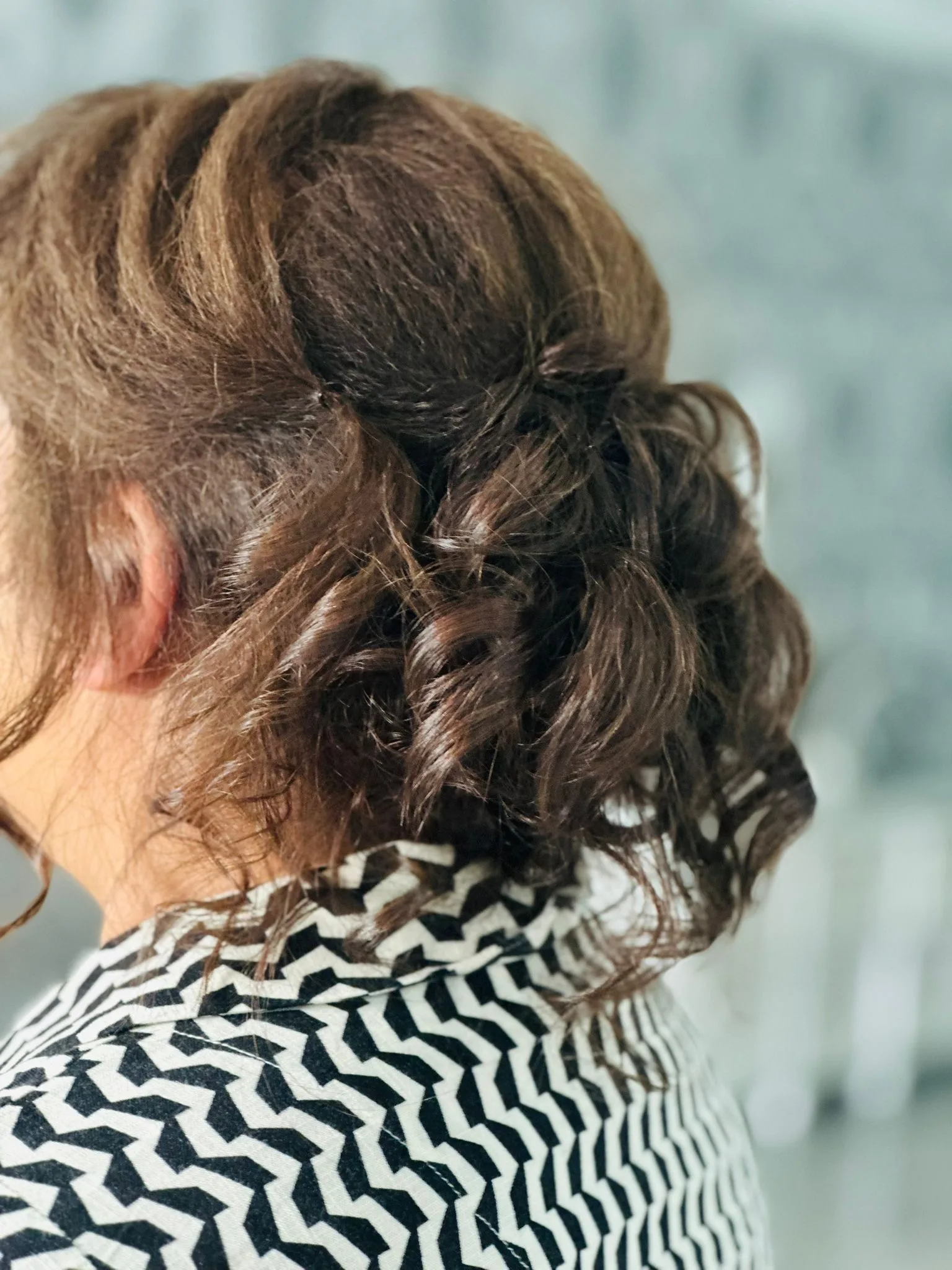Soft textured curled updo, rear view