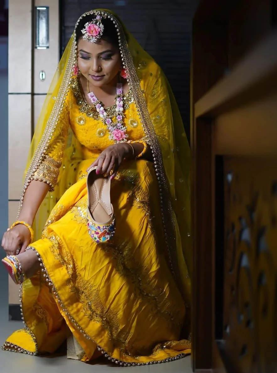 Haldi-day styling in marigold yellow with floral jewellery